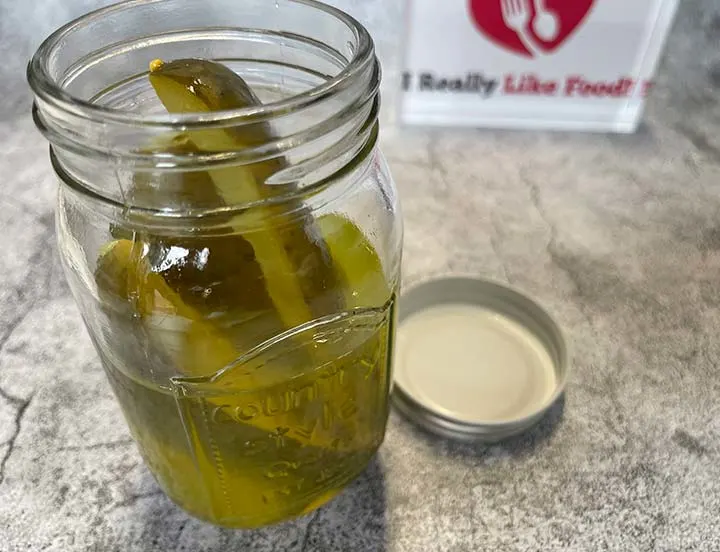 Pickles in Brine Inside a Mason Jar