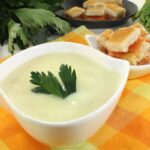 Cream of celery soup with crotons