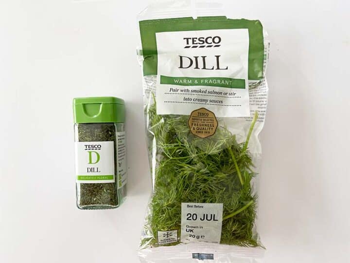 A jar of dried dill compared to a bag of fresh dill 